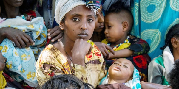 A woman brings her child to a clinic in Wajirat in Southern Tigray in Ethiopia to be checked for malnutrition. — courtesy UNICEF/Christine Nesbitt