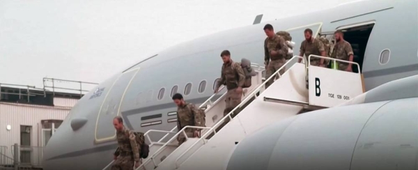 The last of the British troops board the plane to be airlifted to London from Kabul.