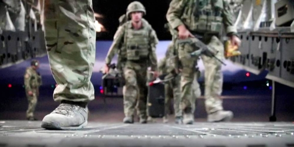 The last of the British troops board the plane to be airlifted to London from Kabul.