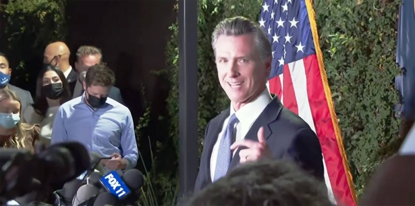 US's California Governor Gavin Newsom delivers a victory speech in Sacramento, California, after surviving the recall election on Tuesday.