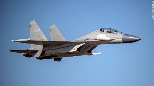 A Chinese PLA J-16 fighter jet flies in an undisclosed location on an undisclosed date in a photo from Taiwan's Defense Ministry.