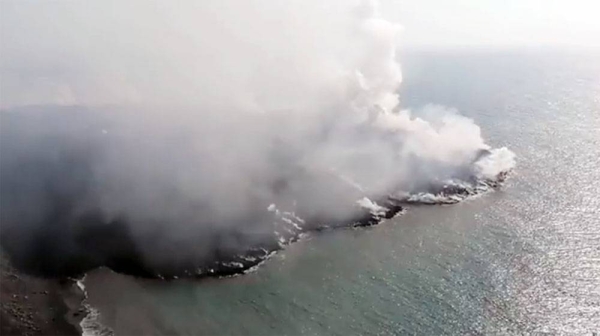 Lava from the volcano has traveled six kilometers and reached the Atlantic Ocean, shown in the satellite image.