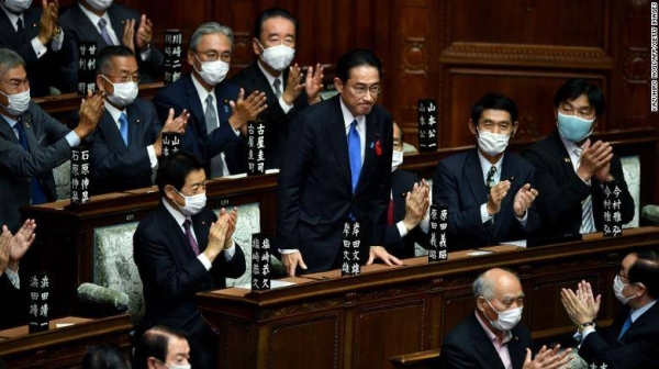 Fumio Kishida is applauded after being elected as Japan's new Prime Minister at the lower house of parliament in Tokyo on Monday.