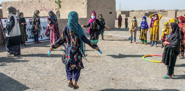 Young girls play at a child friendly space for displaced people at settlement in the outskirts of Herat city in Afghanistan. — courtesy UNICEF/Sayed Bidel