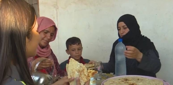 Syrian women are forced to bake bread at home to feed kids due to a severe wheat crisis in the country.