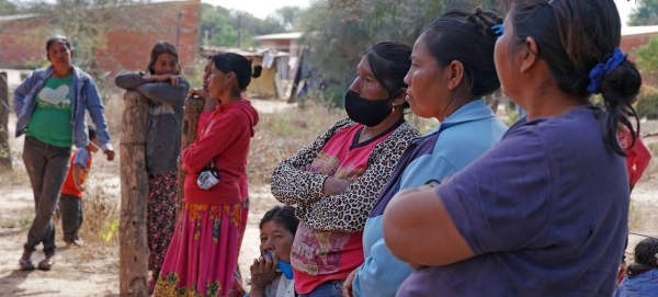 An indigenous community in Paraguay wait to receive their COVID-19 vaccination.