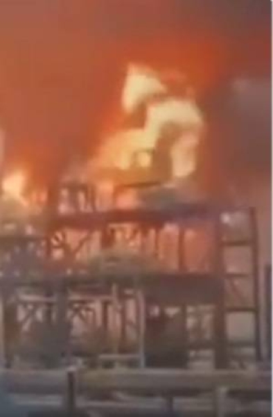The image captured from a Twitter video shows the fire at Mina Al-Ahmadi Oil Refinery in Kuwait on Monday.