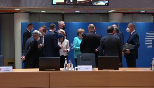 European leaders meet informally during a break at the EU summit in Brussels.