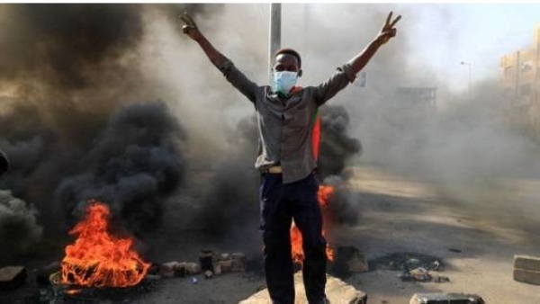 Demonstrators block roads in the Sudanese capital, Khartoum, in protest at the arrests.