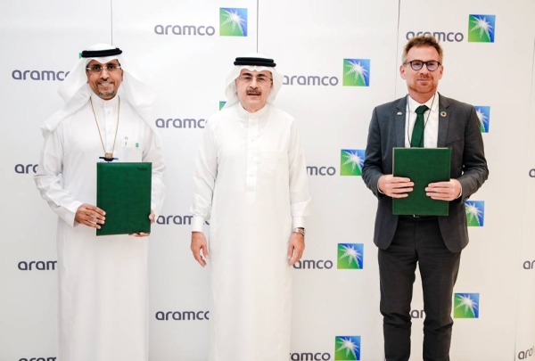 Aramco President and CEO Amin H. Nasser, center, over sees the MoUs signed by Aramco Tuesday as it plans to expand its focus on emerging sectors to drive private sector innovation and investment.