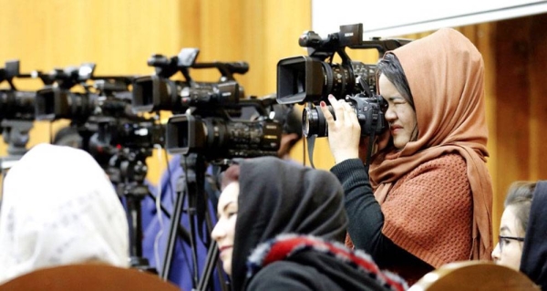 Journalists at an event in Kabul, to mark the Afghan National Journalists Day (March 2019), in support of media freedom and solidarity with journalists in Afghanistan. — courtesy UNAMA/Fardin Waezi