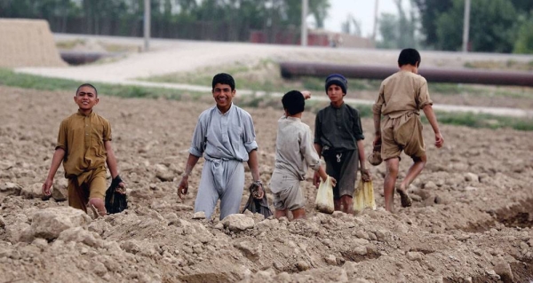 Child farmers help to level fields in Balkh Province, Afghanistan. — courtesy World Bank/Ghullam Abbas Farzami