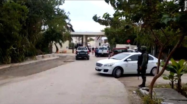 A video showed vehicles in front of the hotel in Quintana Roo, Mexico, where two people were killed in a gunfight Thursday.