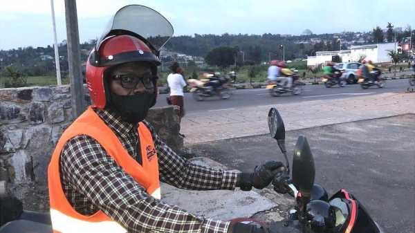 Didier Ndabahariye is one of 25,000 motorbike taxi drivers in Kigali.