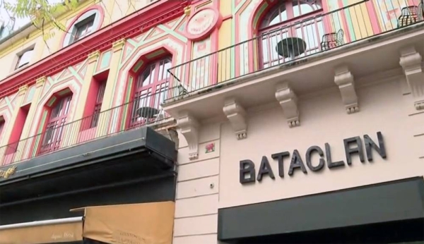 French officials lay wreaths outside the Bataclan concert venue commemorating the 6th anniversary of the Paris terror attacks on Nov. 13 2015.