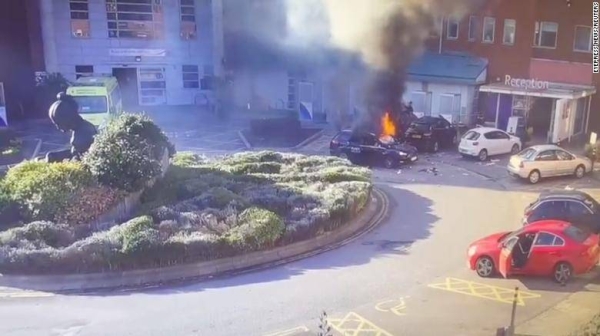 A screengrab from a security video, showing the car seconds after the blast.