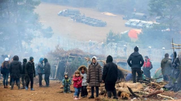 Migrants at a camp on the Belarusian-Polish border.