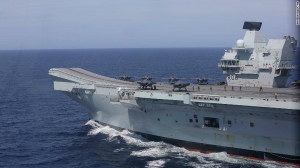 
The aircraft carrier HMS Queen Elizabeth, with F-35 fighter jets on its deck, participates in the NATO Steadfast Defender 2021 exercise off the coast of Portugal in May 2021.