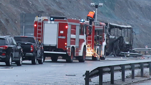 Emergency crews at the scene of the burned-out bus in western Bulgaria.