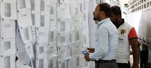 A manual recount of votes from 2018 national election, Baghdad International Fair, Iraq. (file)