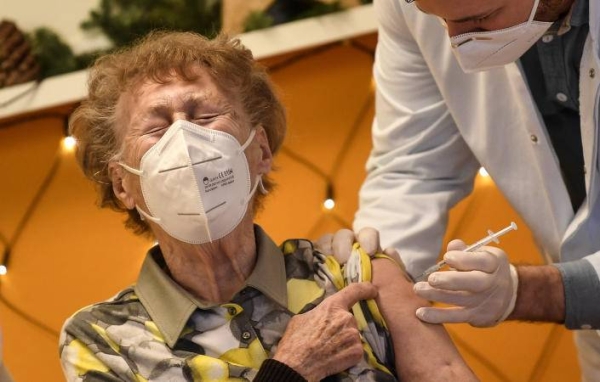 A resident of a nursing home gets the COVID-19 vaccine in Cologne, Germany, on Dec. 27, 2020. (File)