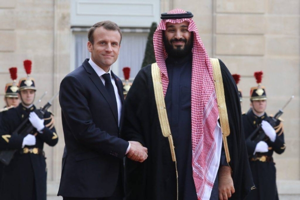 File photo of French President Emmanuel Macron and Crown Prince Muhammad Bin Salman