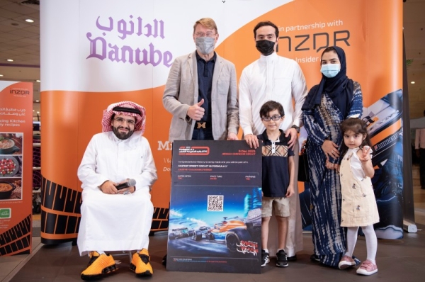 Majed M. Al Tahan, Co-founder and MD of Danube Online and Mika Häkkinen, two-time Formula 1 world champion and founder of INZDR  with the winner