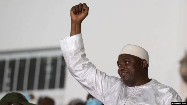 Gambian leader Adama Barrow celebrates after winning the presidential election, in Banjul, Gambia.