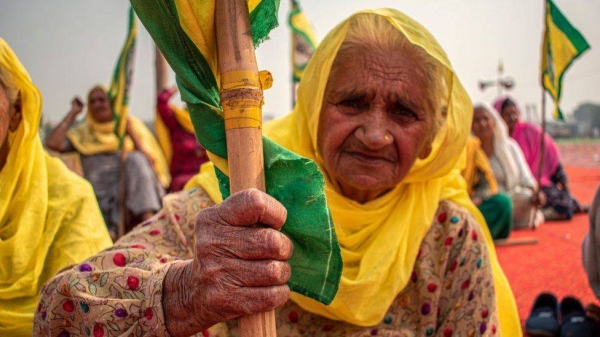 Farmers gather to mark the first anniversary of their protest against the controversial farm laws on the outskirts of Delhi.
