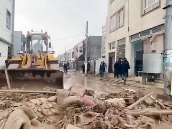 A view of the aftermath after heavy downpours that triggered flash flooding in Erbil.