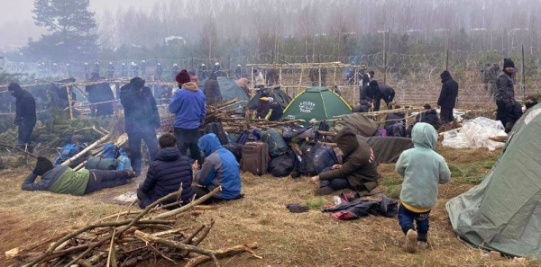 People stranded in Belarus at the Polish border are receiving emergency assistance from UNHCR, IOM and the Belarus Red Cross. — courtesy UNHCR/Katsiaryna Golubeva