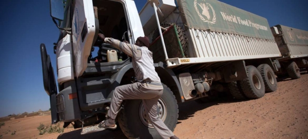 A World Food Programme (WFP) truck driver on a trip from El Fasher to Shangil Tobaya, North Darfur. 