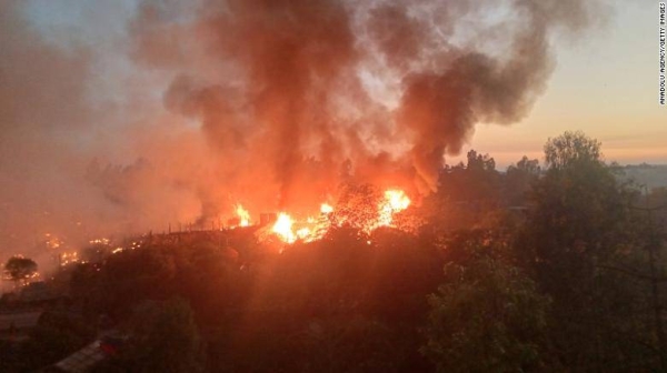 A fire tears through a Rohingya refugee camp in Bangladesh's southern district of Cox's Bazar on Sunday.
