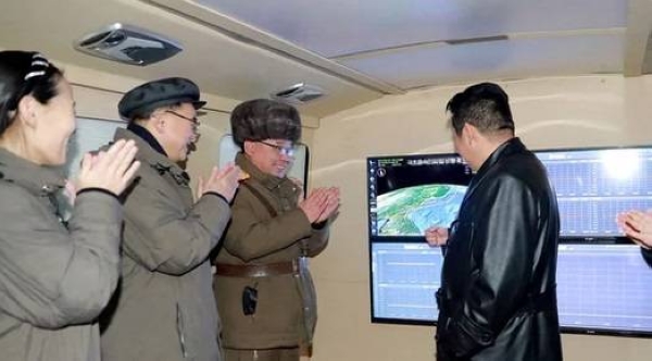 North Korean leader Kim Jong Un oversaw a successful test of a hypersonic missile on Tuesday.