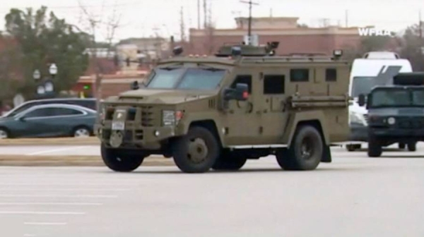 Four people who were held hostage at a synagogue in a suburb of Dallas, Texas, have been freed unharmed after a 10-hour stand-off with police.