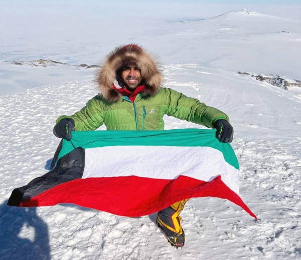 Kuwaiti mountaineer Yousef Al-Refai hoists Kuwait flag atop Mount Sidley in Antarctica.