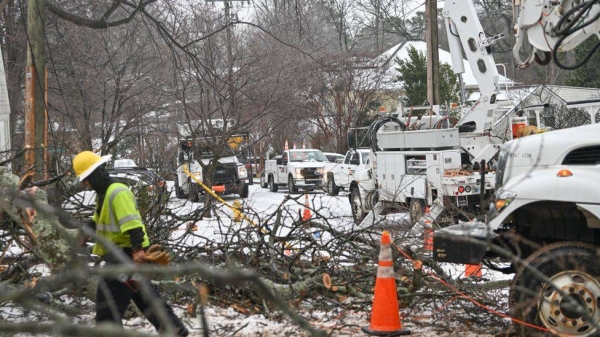 The powerful storm uprooted trees, making some roads impassable in Charlotte, North Carolina.