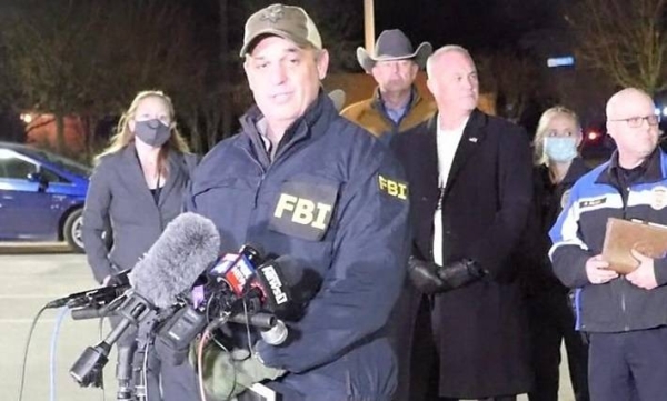 An FBI agent briefs the reporters after the stand-off in Colleyville, Texas.