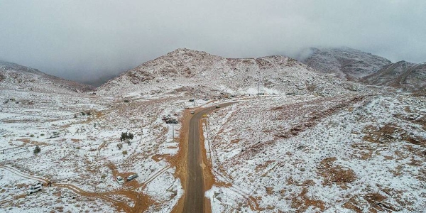 Jabal Al-Lawz is still witnessing snowfall with rain, which marks a climate phenomenon that beautifies the northern region of Tabuk at this time of every year.