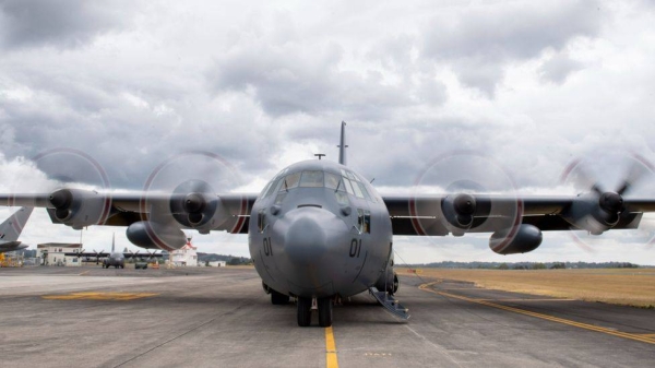 A New Zealand Hercules aircraft carrying emergency supplies on the tarmac at Auckland Airport.