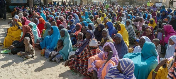 The Under-Secretary-General for Humanitarian Affairs and Emergency Relief Coordinator, Martin Griffiths, speaks with internally displaced people in North East Nigeria. — courtesy UNOCHA/Christina Powell