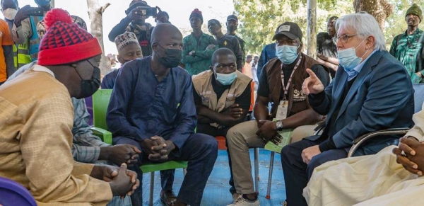 The Under-Secretary-General for Humanitarian Affairs and Emergency Relief Coordinator, Martin Griffiths, speaks with internally displaced people in North East Nigeria. — courtesy UNOCHA/Christina Powell