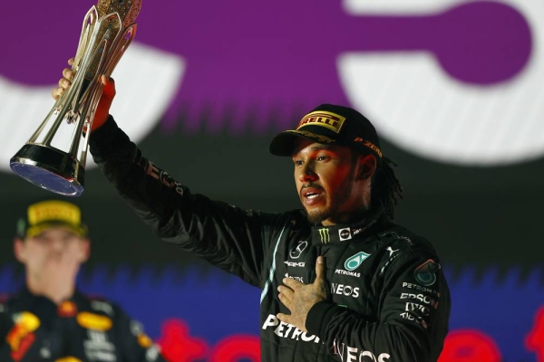 Sir Lewis Hamilton, Mercedes, 1st position, lifts his trophy during the Saudi Arabia GP  at Jeddah Street Circuit in Jeddah, Saudi Arabia. (Photo by Andy Hone)