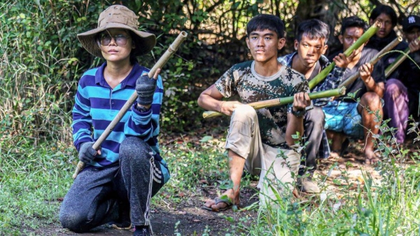 Members of the People's Defence Force (PDF) training in the forests of the Kayin State.