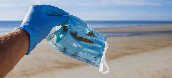 A face mask found during a beach cleanup in Hampton Beach, New Hampshire, US.