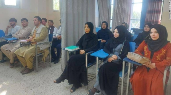 Students attend class at Avicenna University in Kabul, Afghanistan, on September 6, 2021.