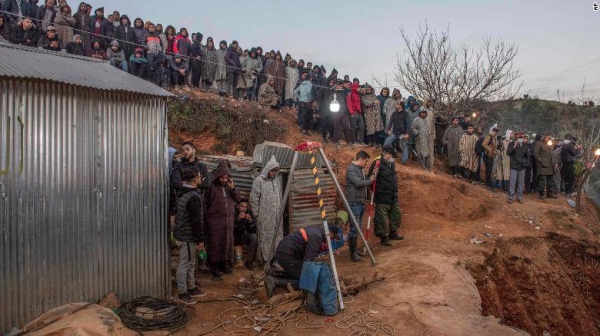 Moroccans wait anxiously as a dramatic operation to rescue a young boy trapped in a deep well nears its end.