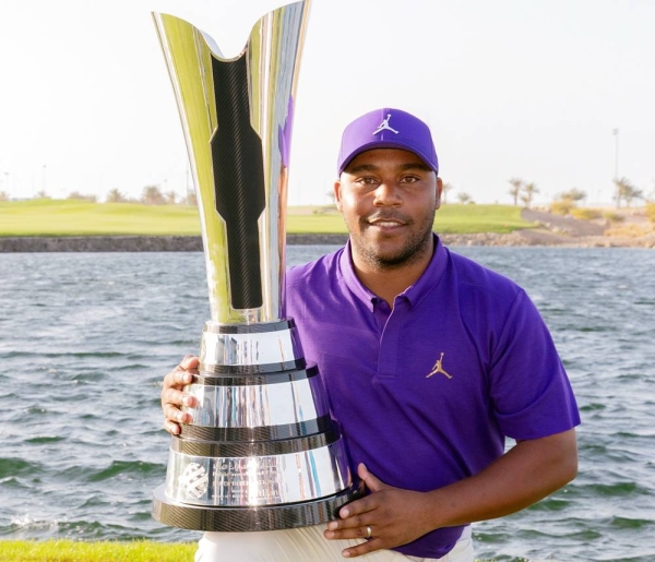 Varner celebrates his mammoth winning putt dropping