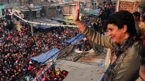 Bhartiya Janata Party (BJP) supporters listen to a speech of India's Home Minister and BJP leader Amit Shah during an election rally in Loni, Ghaziabad district of Uttar Pradesh.