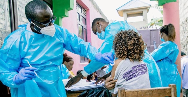 A woman is vaccinated against COVID-19 in Goma, Democratic Republic of the Congo. — courtesy UNICEF/Jospin Benekire